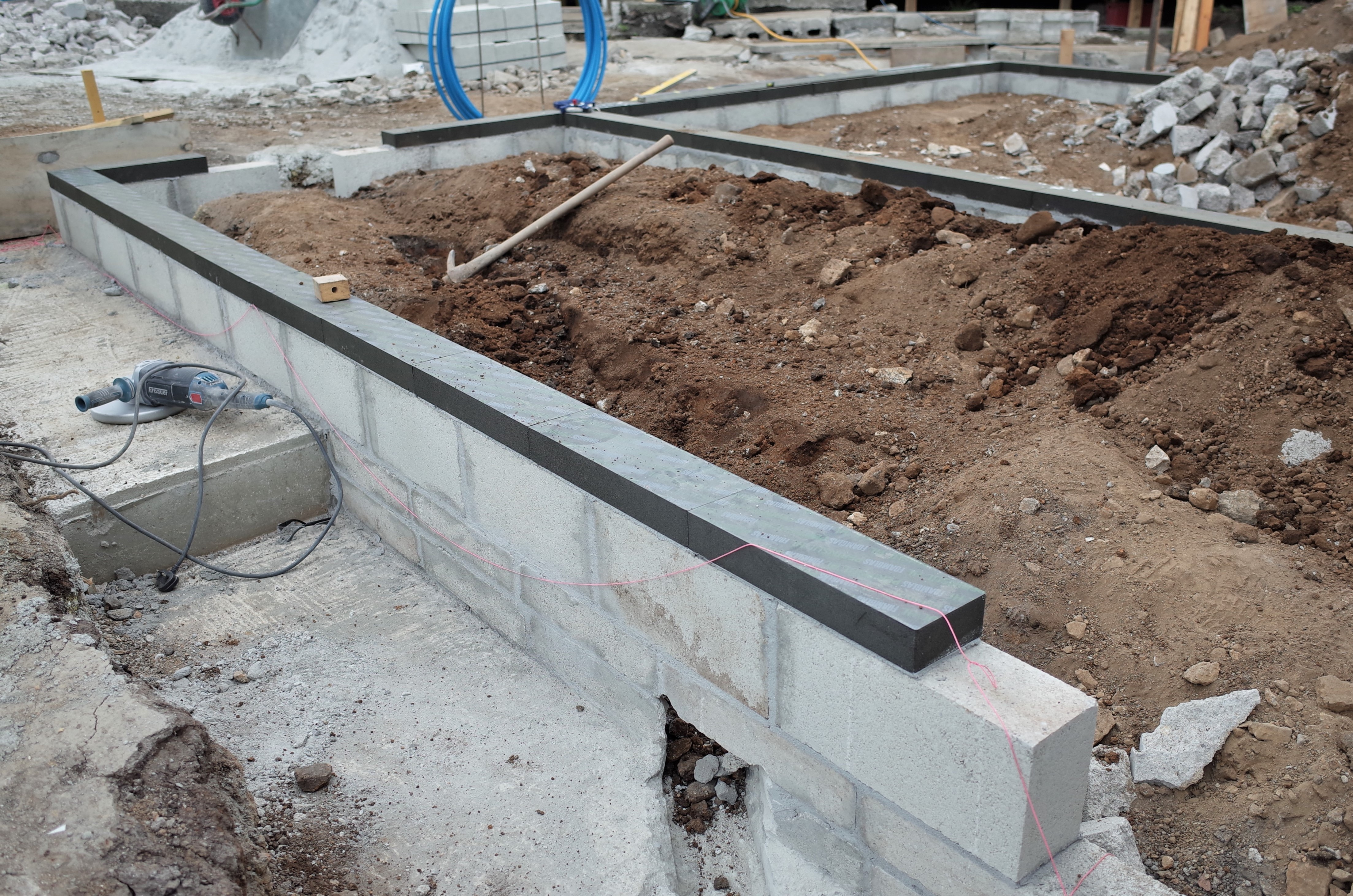 Base of wall insulation on construction site